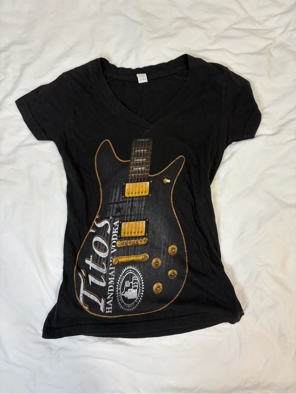 Black Graphic Guitar V-Neck Tee with Gold Accents